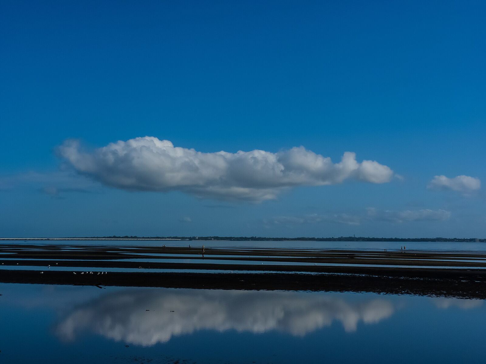 Glassy morning water on Bramble Bay at Shorncliffe